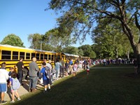 Fathers walking students to school