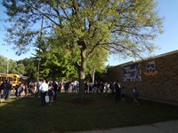 Fathers walking students to school