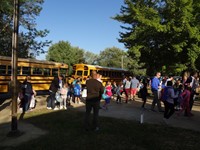 Fathers walking students to school