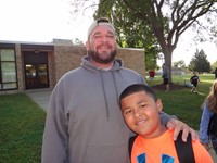 Fathers walking students to school