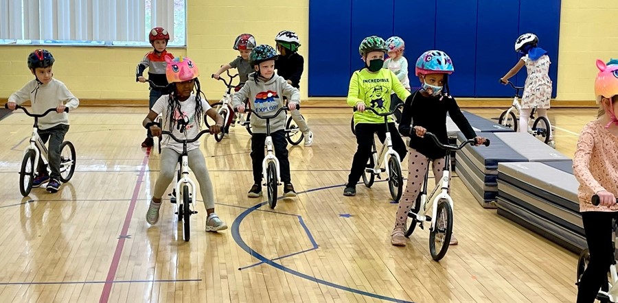 students riding bikes
