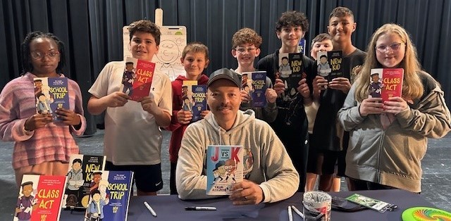 students at book signing