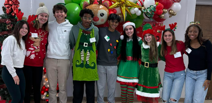 students dressed in Holiday outfits