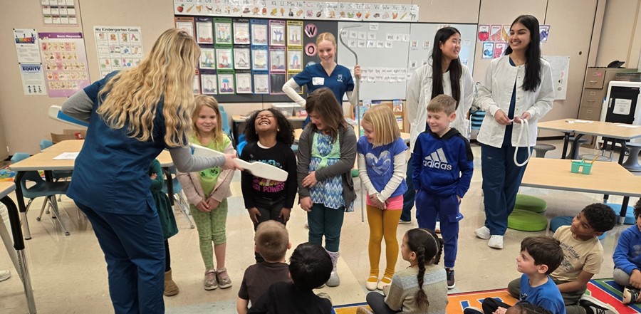 CVCC students teaching kindergarten students about dental health
