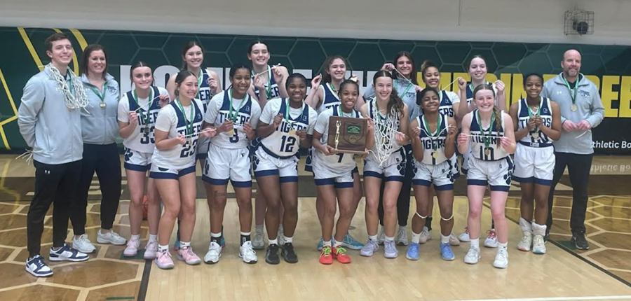 girls basketball team and coaches